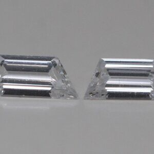 A Pair Of Trapezoid Step Loose Diamonds (0.43 Ct D Vvs2) C52000041